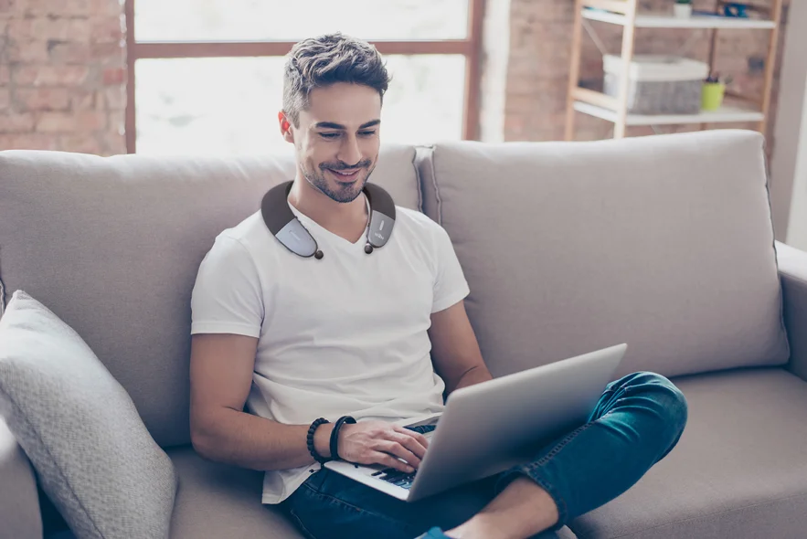 Man wearing the BeHear Proxy - Hearing Amplifier & Wireless Neck Speaker