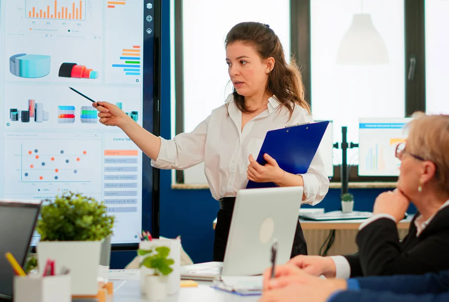 woman presenting in a meeting room