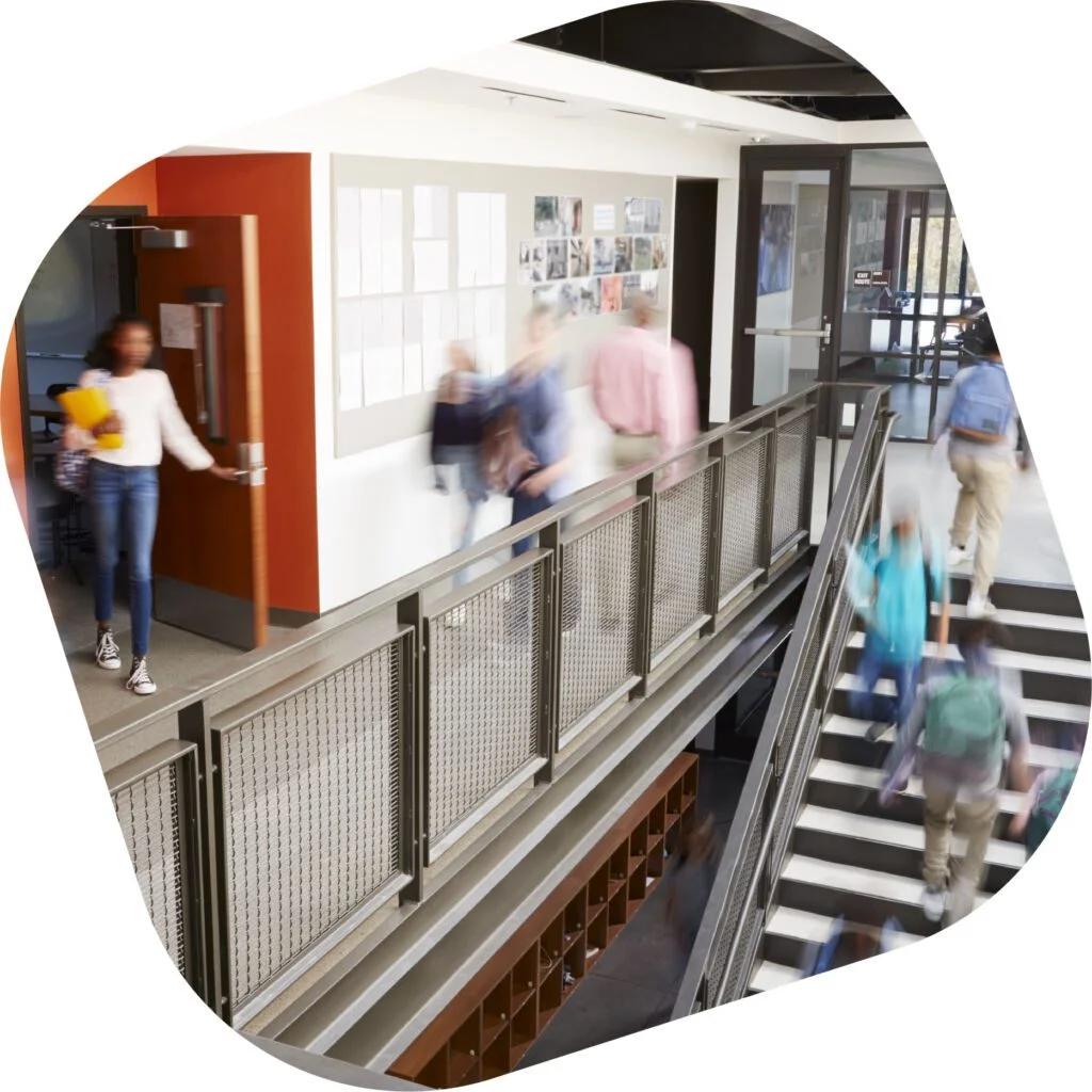 student walking in hallways and staircase